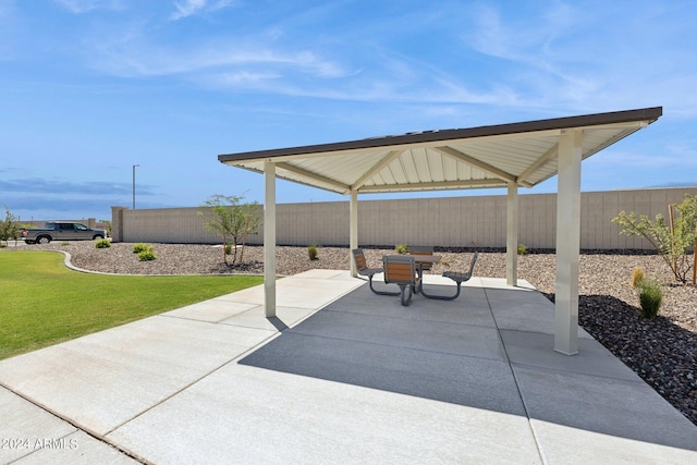 view of patio featuring a gazebo and fence