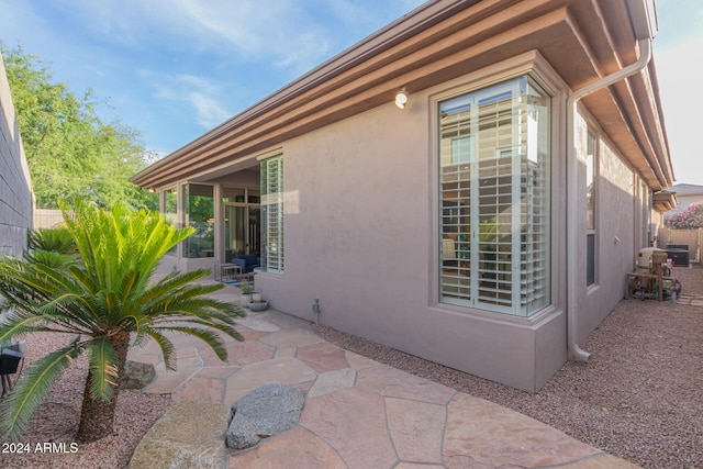 view of home's exterior with a patio area