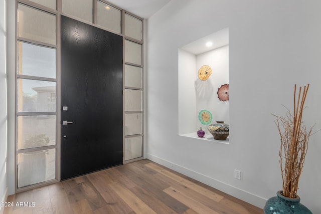 foyer entrance with light hardwood / wood-style flooring