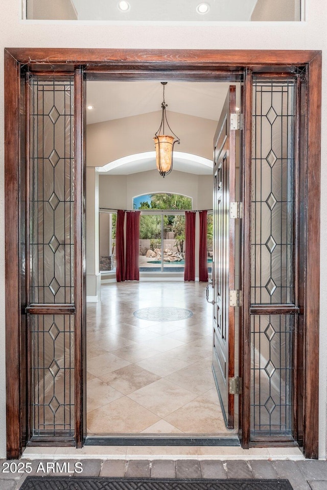 12120 E Cortez Dr, Scottsdale, AZ 85259 - entryway with lofted ceiling, recessed lighting, and arched walkways