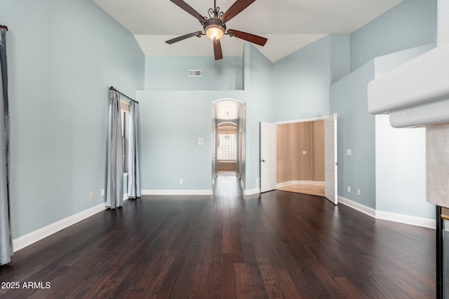 12120 E Cortez Dr, Scottsdale, AZ 85259 - unfurnished living room featuring high vaulted ceiling, a ceiling fan, arched walkways, and wood finished floors