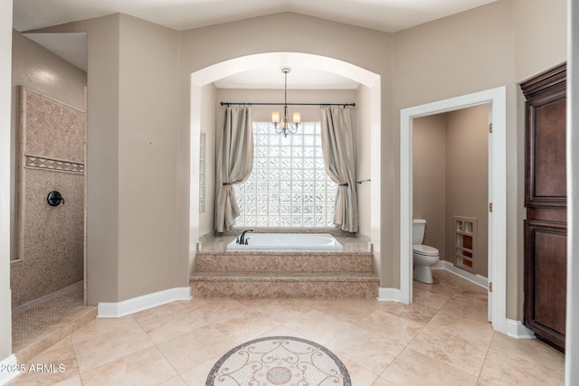 12120 E Cortez Dr, Scottsdale, AZ 85259 - full bath featuring a bath, a chandelier, tile patterned flooring, and tiled shower