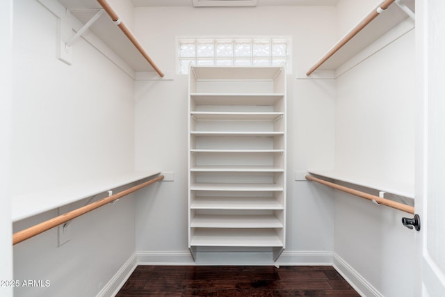 12120 E Cortez Dr, Scottsdale, AZ 85259 - walk in closet with dark wood-style floors