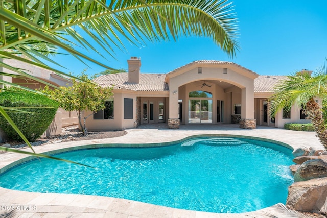 12120 E Cortez Dr, Scottsdale, AZ 85259 - swimming pool featuring french doors, a patio area, and a ceiling fan