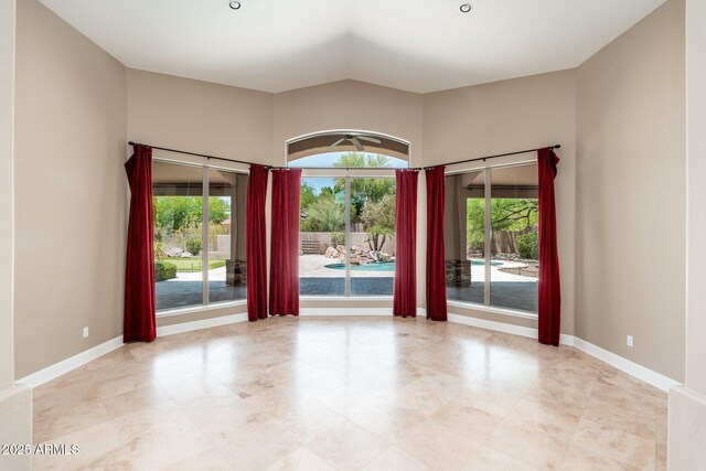 12120 E Cortez Dr, Scottsdale, AZ 85259 - empty room with lofted ceiling and baseboards