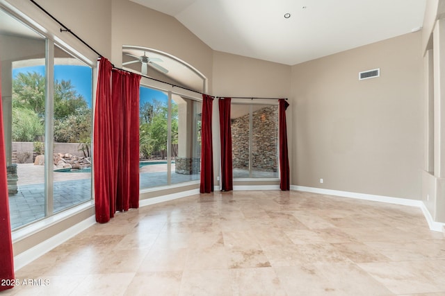 12120 E Cortez Dr, Scottsdale, AZ 85259 - spare room with a ceiling fan and lofted ceiling