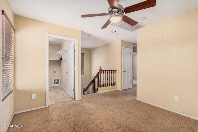 22123 E Via Del Palo, Queen Creek, AZ 85142 - empty room with baseboards, ceiling fan, carpet flooring, and visible vents