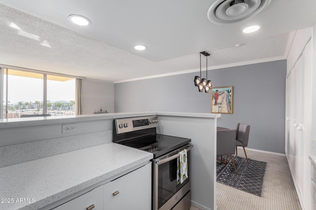 kitchen with hanging light fixtures, stainless steel electric range oven, ornamental molding, and white cabinetry