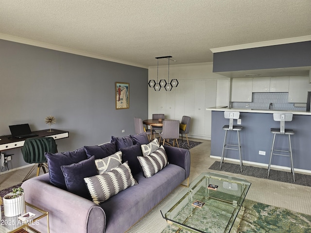 carpeted living room with crown molding and a textured ceiling