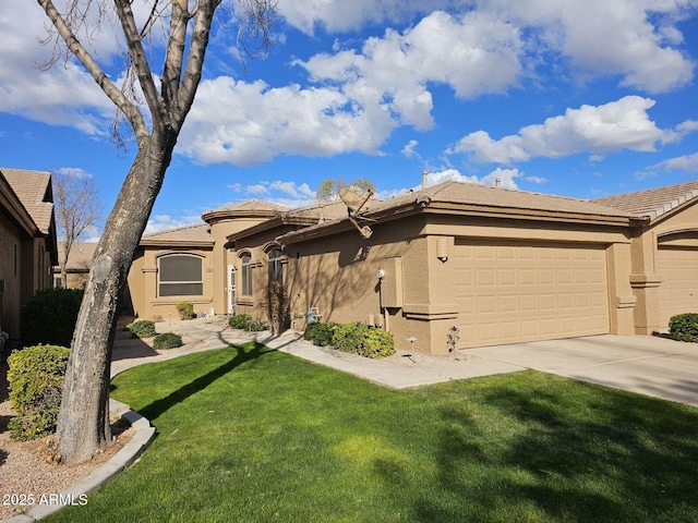 view of front of home featuring a garage and a front yard