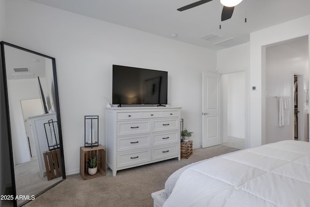 bedroom featuring light colored carpet, ceiling fan, and visible vents