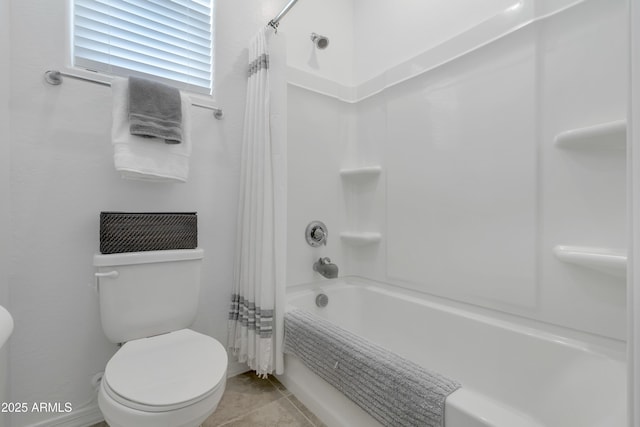 full bath with shower / bath combination with curtain, tile patterned flooring, and toilet