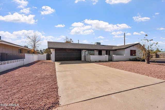 ranch-style house with a garage