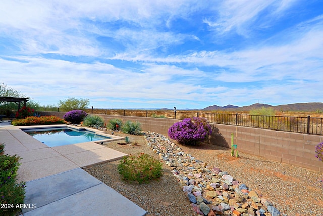 view of pool featuring a mountain view