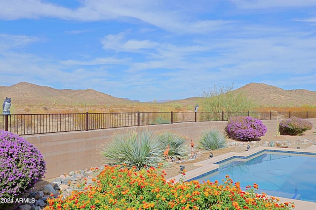 view of pool featuring a mountain view