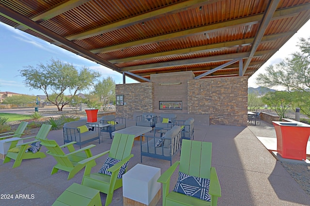 view of patio with outdoor lounge area and a mountain view