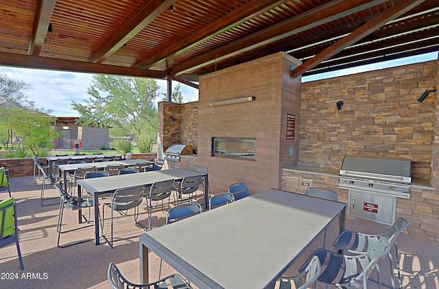 view of patio with a grill