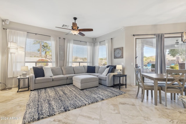 living room with ceiling fan