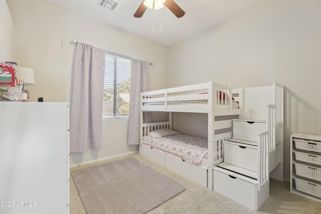 bedroom with light carpet and ceiling fan