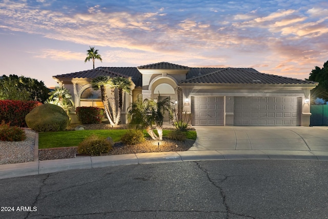 view of front of home with a garage