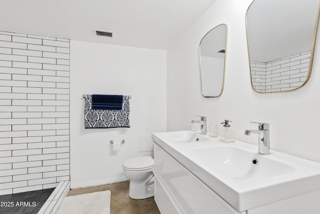 full bath with toilet, tiled shower, visible vents, and a sink