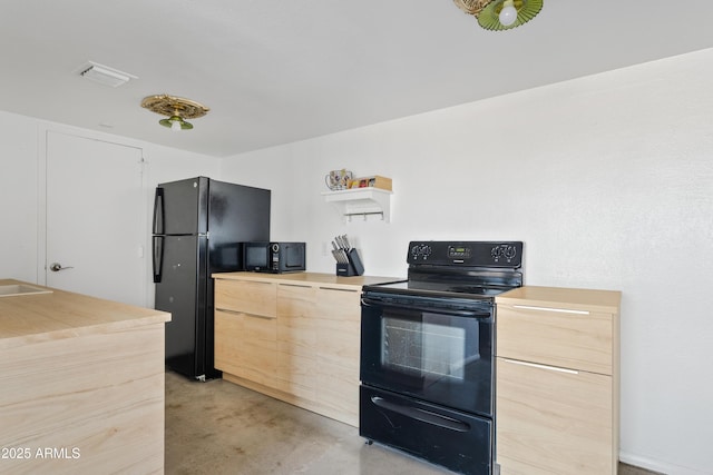 kitchen with visible vents, concrete flooring, light countertops, black appliances, and open shelves