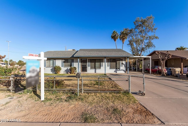 single story home featuring a carport