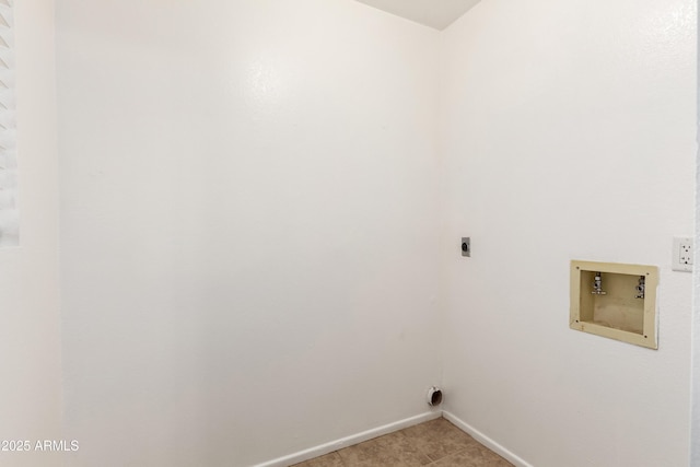 clothes washing area with laundry area, hookup for a washing machine, electric dryer hookup, and baseboards