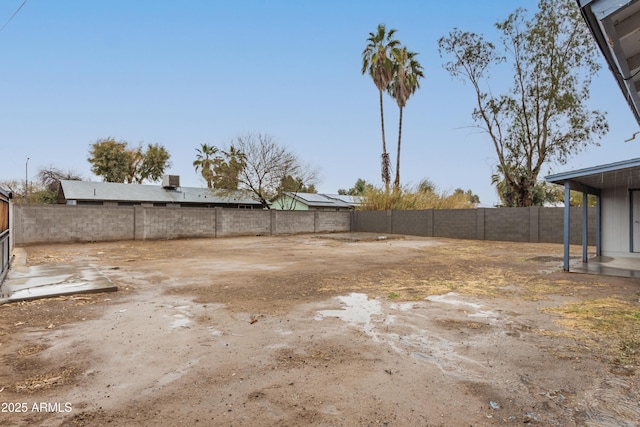 view of yard featuring a fenced backyard