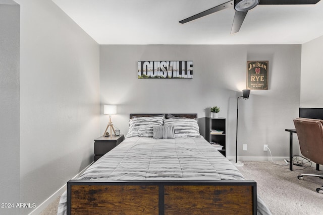 bedroom with ceiling fan and light colored carpet