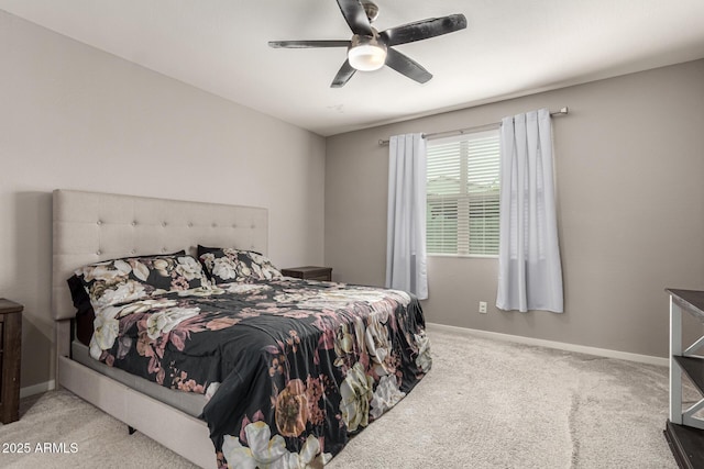 bedroom featuring carpet floors, baseboards, and a ceiling fan
