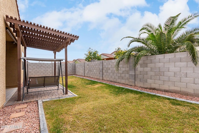 view of yard with a pergola and a patio area