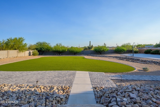 view of community with a lawn