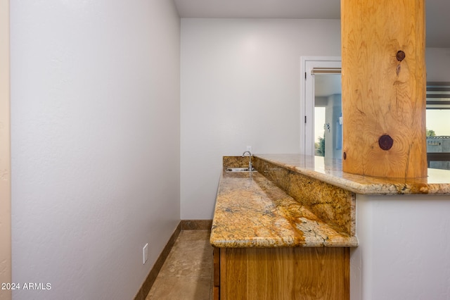 bathroom featuring sink and tile patterned floors