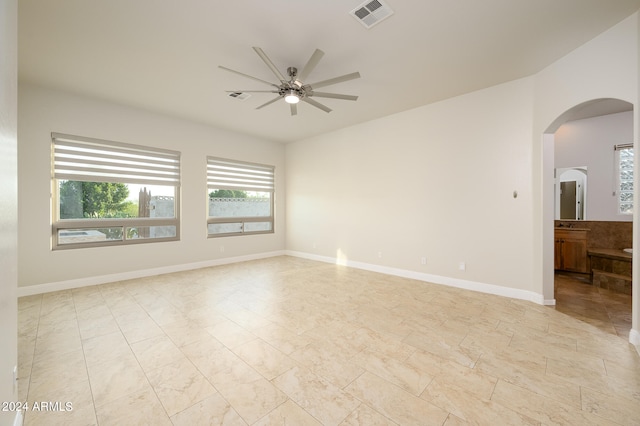 spare room with ceiling fan