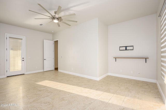 spare room featuring ceiling fan