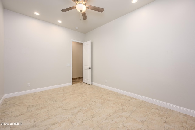 empty room featuring ceiling fan