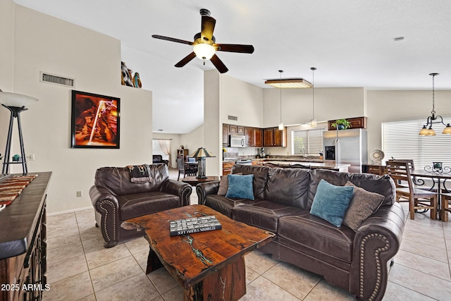 4131 E Cascalote Dr, Cave Creek, AZ 85331 - living area featuring high vaulted ceiling, a ceiling fan, and light tile patterned flooring