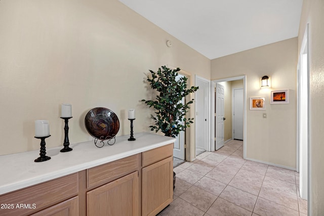 4131 E Cascalote Dr, Cave Creek, AZ 85331 - hallway featuring light tile patterned floors and baseboards