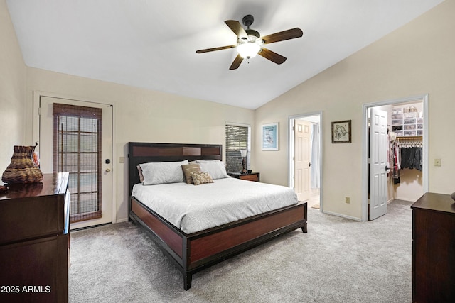 4131 E Cascalote Dr, Cave Creek, AZ 85331 - bedroom featuring light carpet, lofted ceiling, access to outside, ceiling fan, and a spacious closet