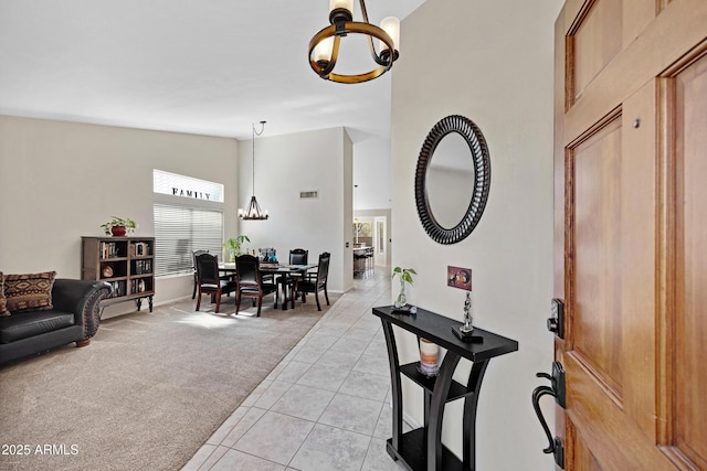 4131 E Cascalote Dr, Cave Creek, AZ 85331 - entrance foyer with a chandelier, light colored carpet, and light tile patterned flooring