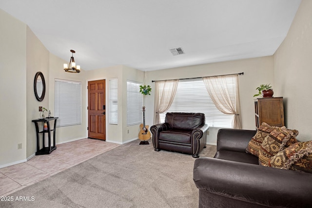 4131 E Cascalote Dr, Cave Creek, AZ 85331 - living room with a chandelier, light tile patterned flooring, and light carpet