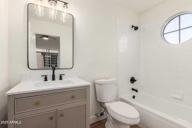 full bathroom with vanity, shower / bathtub combination, and toilet