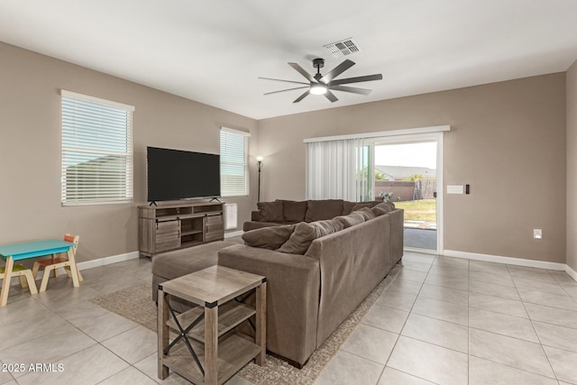 37008 N Hinterwald Way, San Tan Valley, AZ 85143 - living area with baseboards, ceiling fan, visible vents, and light tile patterned floors