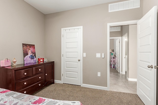 37008 N Hinterwald Way, San Tan Valley, AZ 85143 - bedroom with light tile patterned floors, baseboards, light colored carpet, and visible vents
