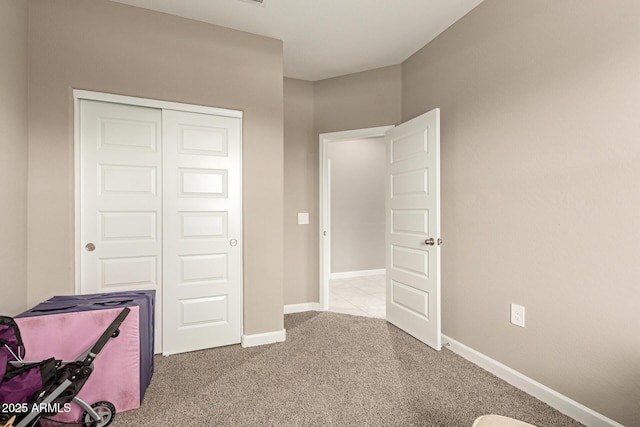 37008 N Hinterwald Way, San Tan Valley, AZ 85143 - unfurnished bedroom with a closet, carpet flooring, and baseboards