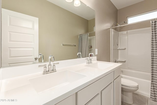 37008 N Hinterwald Way, San Tan Valley, AZ 85143 - full bathroom featuring double vanity, toilet, a sink, and tile patterned flooring