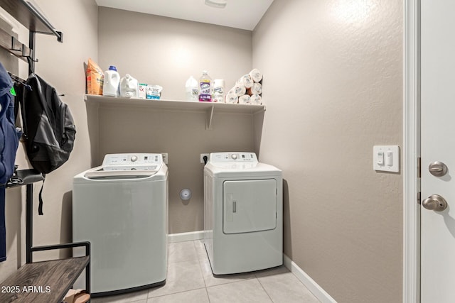 37008 N Hinterwald Way, San Tan Valley, AZ 85143 - clothes washing area featuring laundry area, baseboards, light tile patterned flooring, and separate washer and dryer