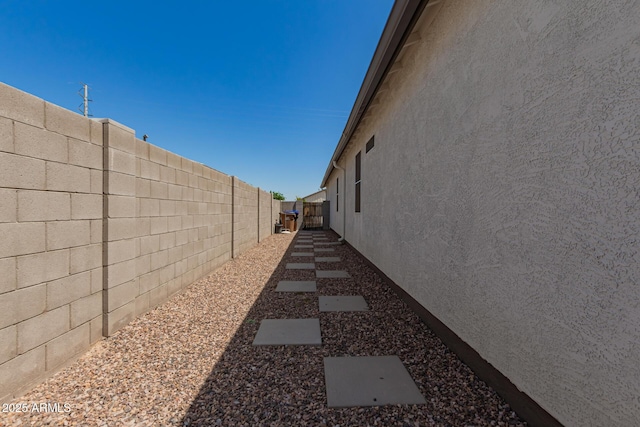 37008 N Hinterwald Way, San Tan Valley, AZ 85143 - view of property exterior with a fenced backyard and stucco siding