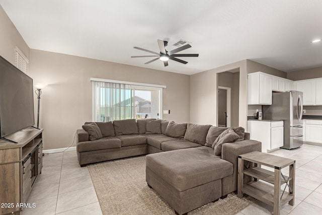 37008 N Hinterwald Way, San Tan Valley, AZ 85143 - living room featuring light tile patterned floors, baseboards, a ceiling fan, and visible vents